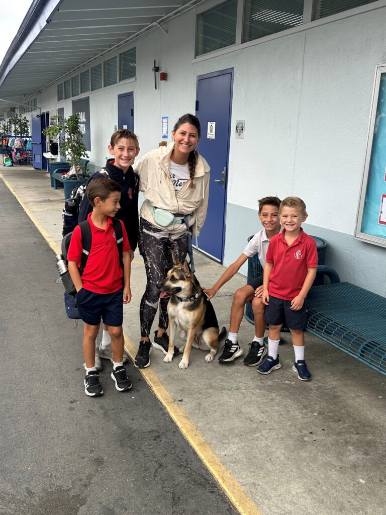 Families bring their pets to school to be blessed.