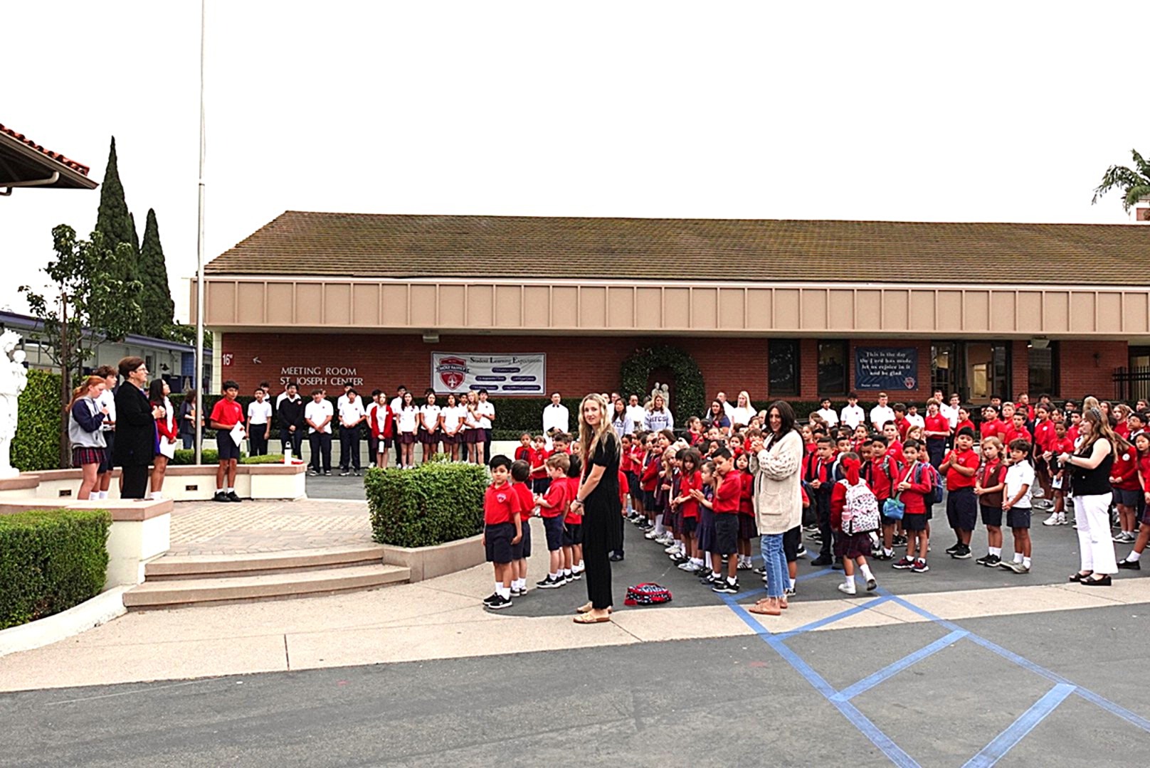 Students meet at morning assembly at Holy Family Catholic School to prepare for the Blessing of the Animals event.
